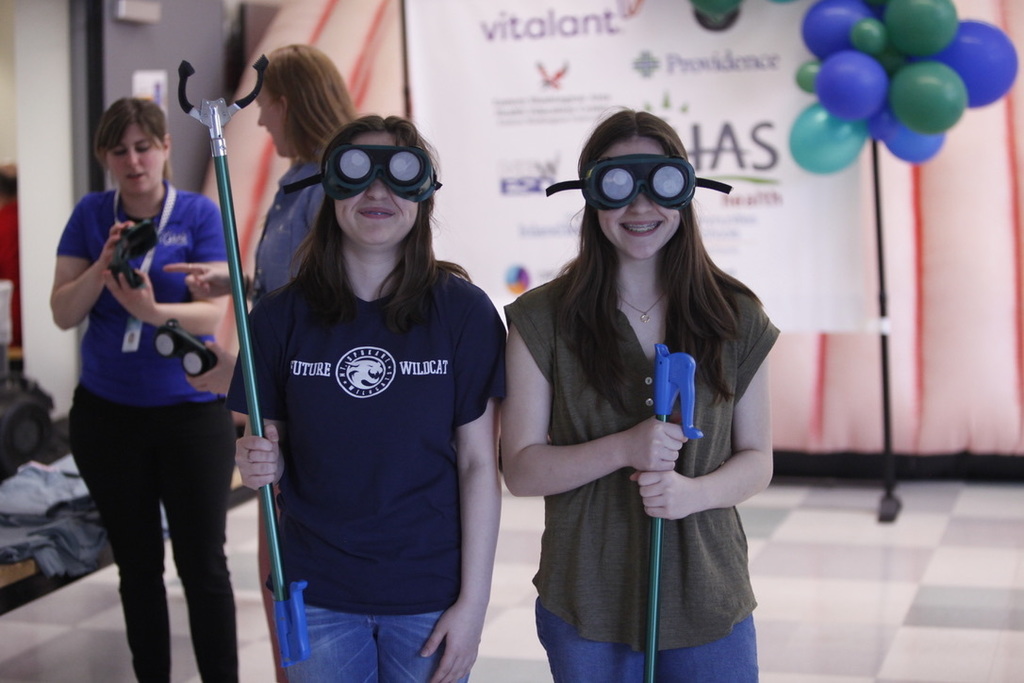 Students with vision impairment goggles on